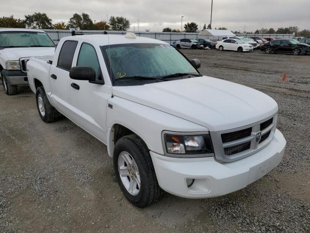 DODGE DAKOTA SLT 2011 with VIN 1D7RW3GP4BS572129 - Photo from auction