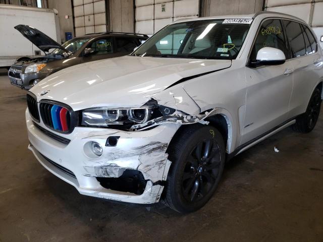Photo 9 from auction – 2014 BMW X5 SDRIVE3 with VIN 5UXKR2C54E0H33016