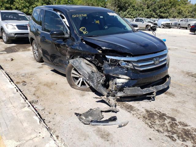 HONDA PILOT EXL 2016 with VIN 5FNYF6H68GB125238 - Photo from auction