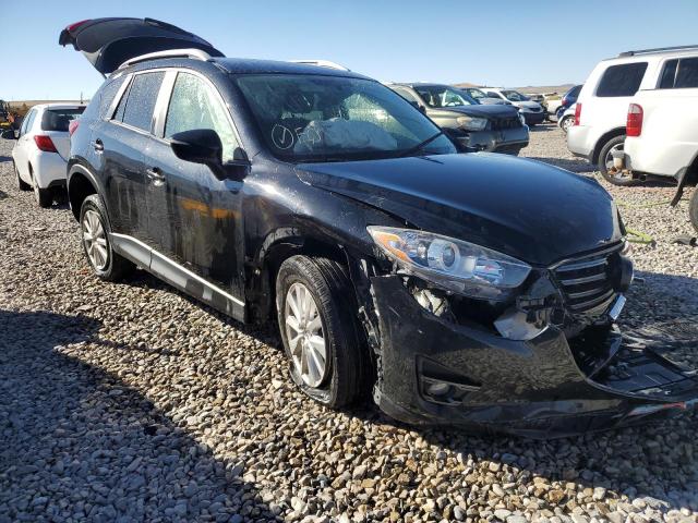 MAZDA CX-5 TOURI 2016 with VIN JM3KE4CY8G0773142 - Photo from auction