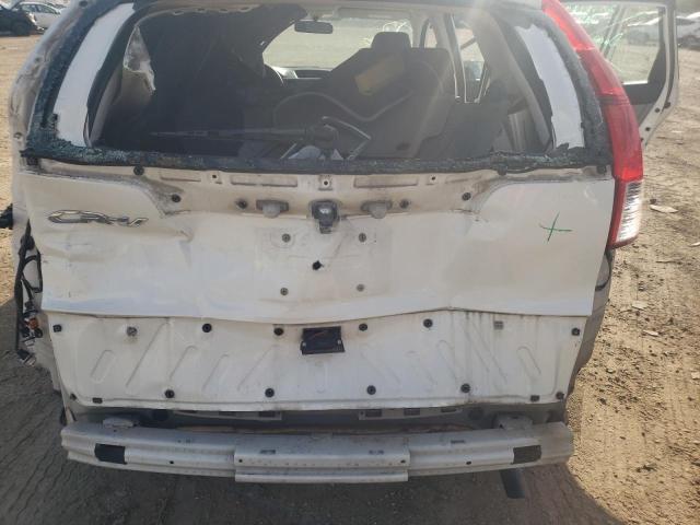 Photo 9 from auction – 2014 HONDA CR-V LX with VIN 5J6RM3H33EL037068