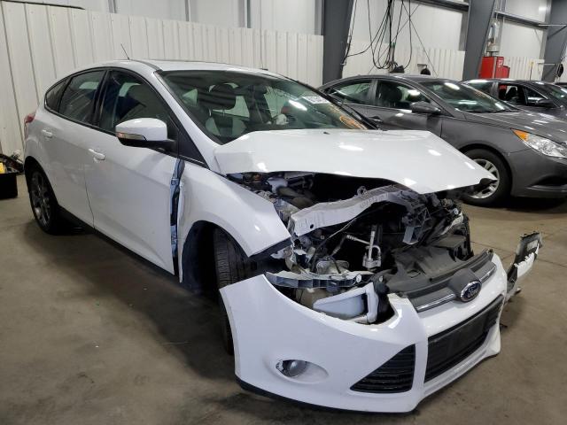 FORD FOCUS SE 2014 with VIN 1FADP3K29EL318207 - Photo from auction