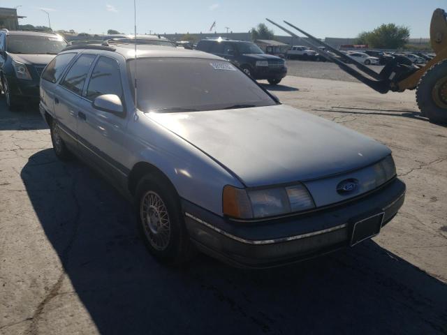 FORD TAURUS LX 1990 with VIN 1FACP5844LG173485 - Photo from auction