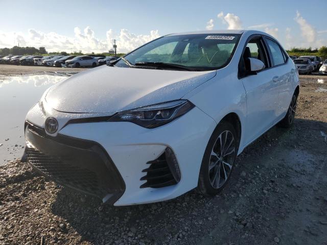 Photo 2 from auction – 2018 TOYOTA COROLLA SE with VIN 5YFBURHE3JP843697