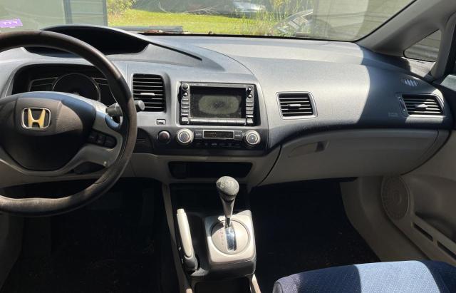 Photo 9 from auction – 2006 HONDA CIVIC HYBR with VIN JHMFA36256S014148