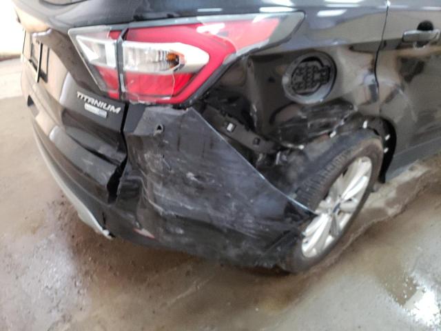 Photo 9 from auction – 2017 FORD ESCAPE TIT with VIN 1FMCU9J98HUA70283