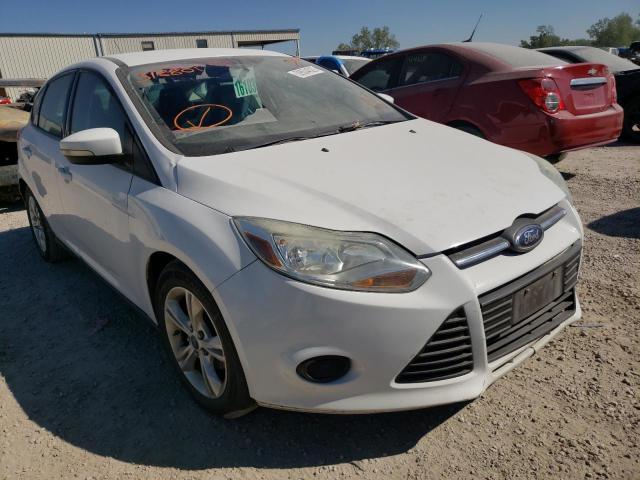 FORD FOCUS SE 2014 with VIN 1FADP3K2XEL318801 - Photo from auction