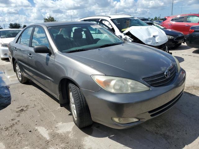 TOYOTA CAMRY LE 2004 with VIN 4T1BE32K74U816398 - Photo from auction