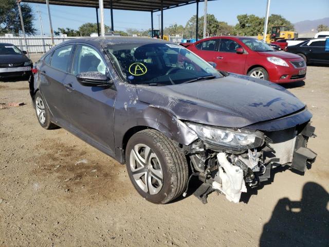 HONDA CIVIC LX 2018 with VIN 2HGFC2F55JH601953 - Photo from auction