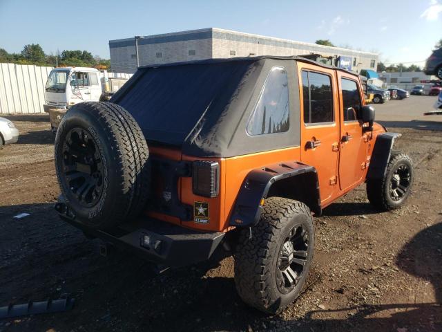 Photo 4 from auction – 2011 JEEP WRANGLER U with VIN 1J4BA5H11BL520073