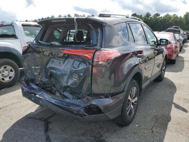 Photo 4 from auction – 2017 TOYOTA RAV4 XLE with VIN 2T3RFREV0HW684683