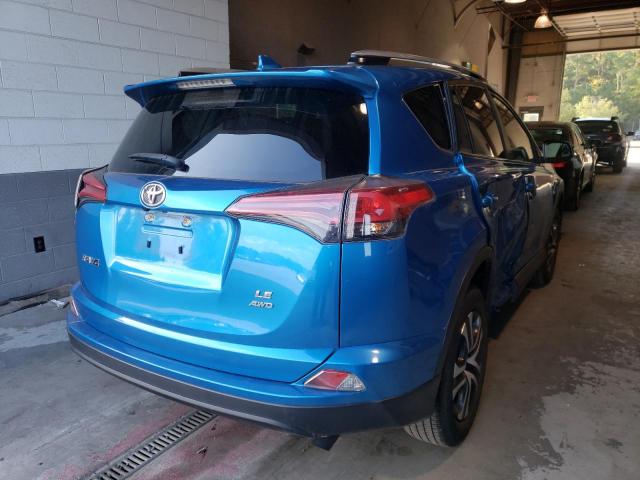 Photo 4 from auction – 2018 TOYOTA RAV4 LE with VIN JTMBFREV2JJ212541