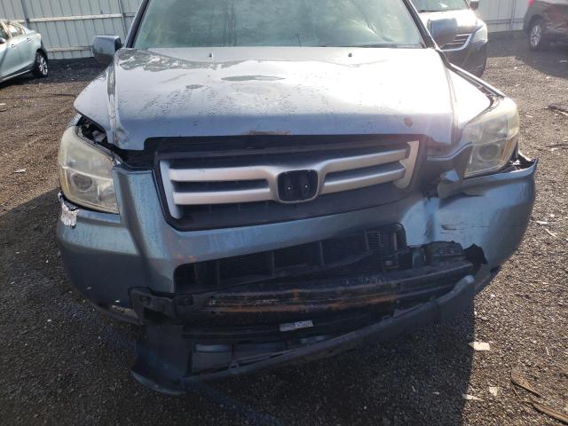 Photo 9 from auction – 2006 HONDA PILOT EX with VIN 2HKYF18496H545530