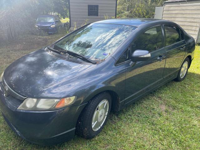 Photo 2 from auction – 2006 HONDA CIVIC HYBR with VIN JHMFA36256S014148