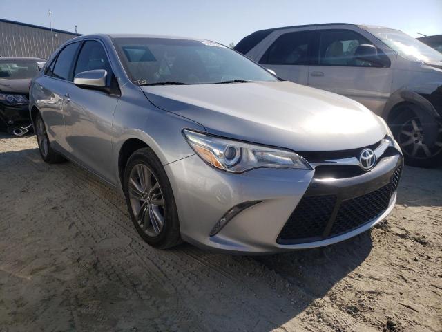 TOYOTA CAMRY LE 2015 with VIN 4T1BF1FK7FU048890 - Photo from auction