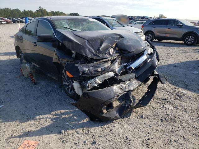 HONDA CIVIC EX 2018 with VIN 19XFC2F70JE012417 - Photo from auction