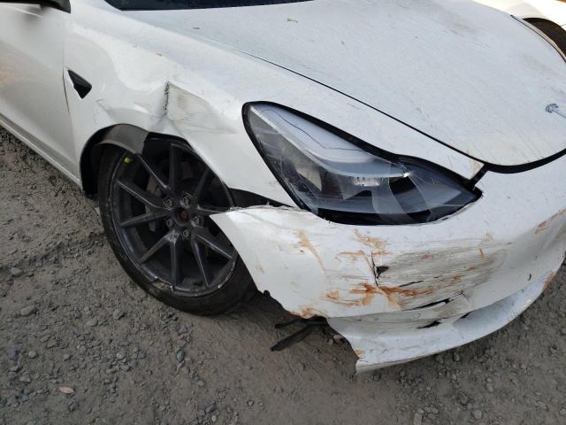 Photo 9 from auction – 2021 TESLA MODEL 3 with VIN 5YJ3E1EB7MF073730