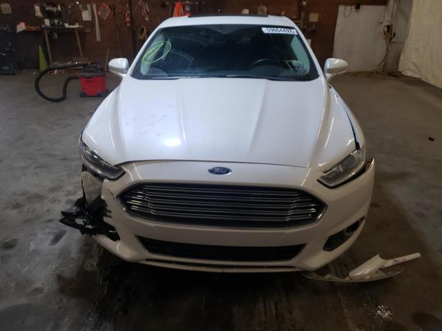 Photo 7 from auction – 2014 FORD FUSION TIT with VIN 3FA6P0RU7ER232149