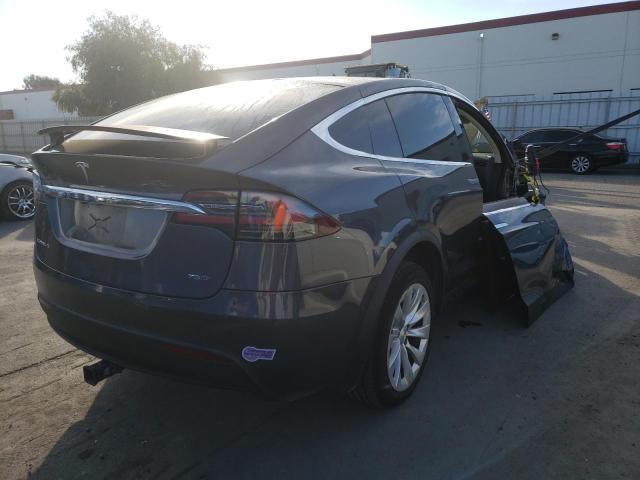 Photo 4 from auction – 2018 TESLA MODEL X with VIN 5YJXCAE22JF136591