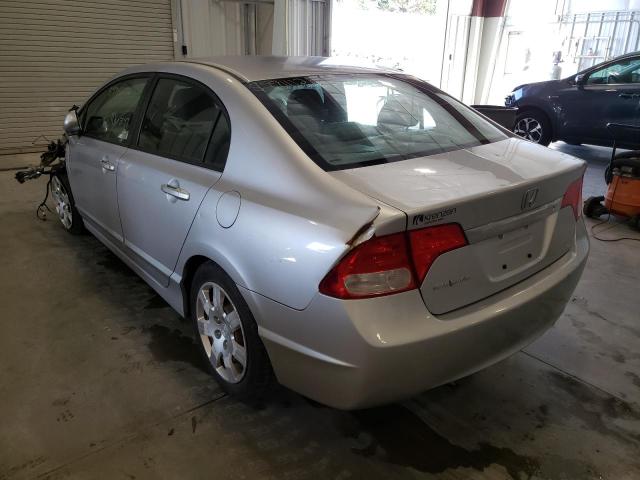 Photo 3 from auction – 2011 HONDA CIVIC LX with VIN 19XFA1F52BE030093