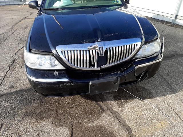 Photo 9 from auction – 2004 LINCOLN TOWN CAR E with VIN 1LNHM81W84Y656135