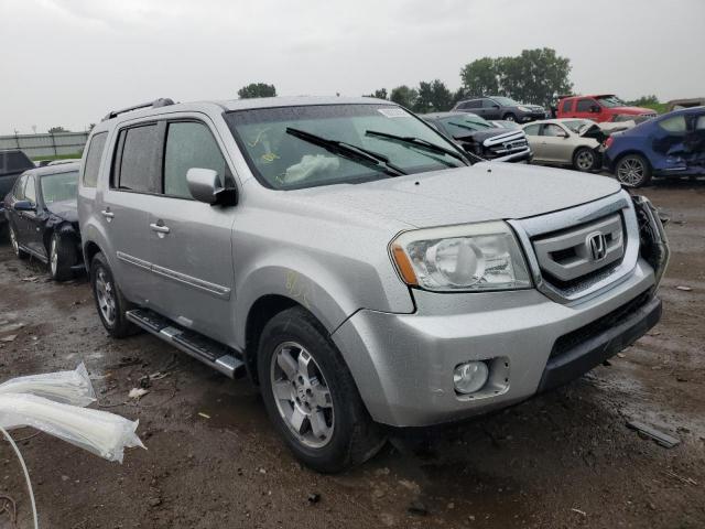 HONDA PILOT TOUR 2010 with VIN 5FNYF4H97AB035875 - Photo from auction