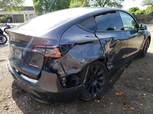Photo 4 from auction – 2022 TESLA MODEL Y with VIN 7SAYGAEEXNF381487