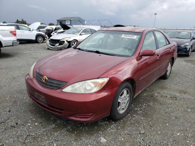Photo 2 from auction – 2002 TOYOTA CAMRY LE with VIN 4T1BF30K52U021072