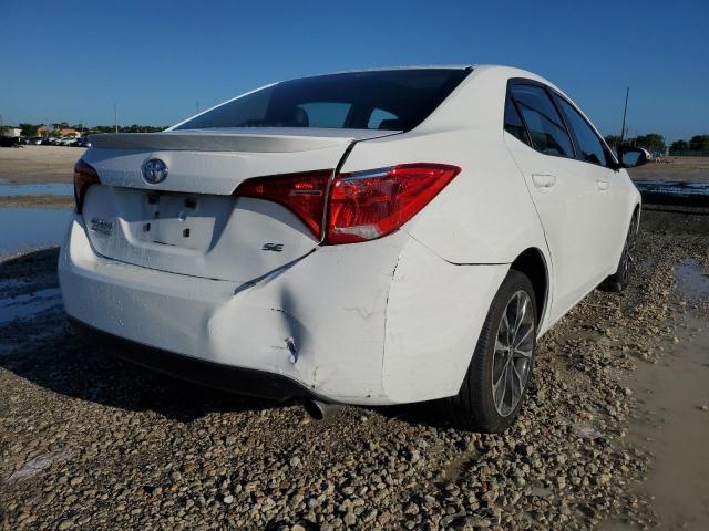 Photo 4 from auction – 2018 TOYOTA COROLLA SE with VIN 5YFBURHE3JP843697