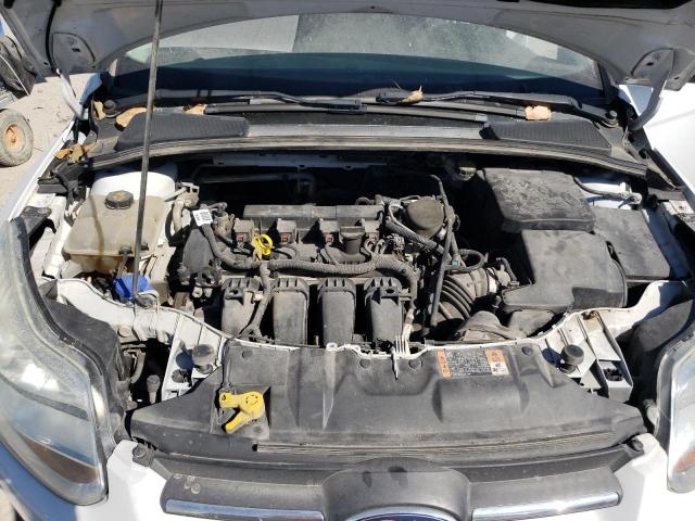Photo 7 from auction – 2014 FORD FOCUS SE with VIN 1FADP3K2XEL318801