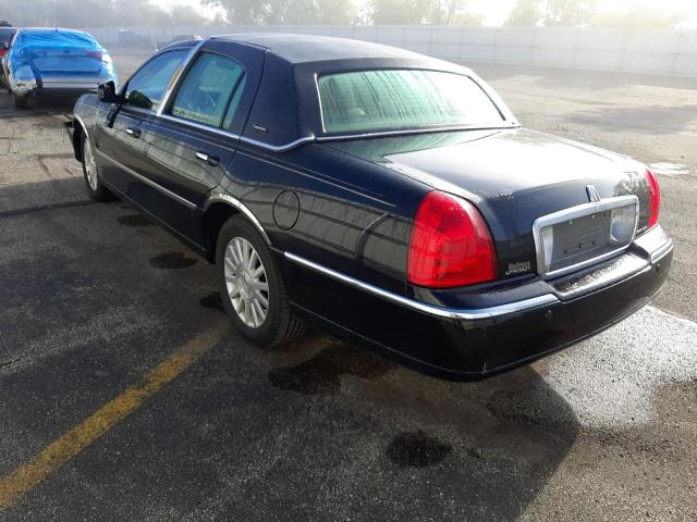 Photo 3 from auction – 2004 LINCOLN TOWN CAR E with VIN 1LNHM81W84Y656135