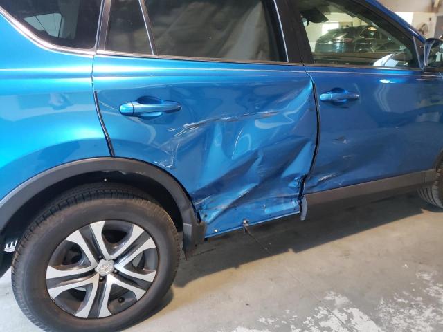 Photo 9 from auction – 2018 TOYOTA RAV4 LE with VIN JTMBFREV2JJ212541