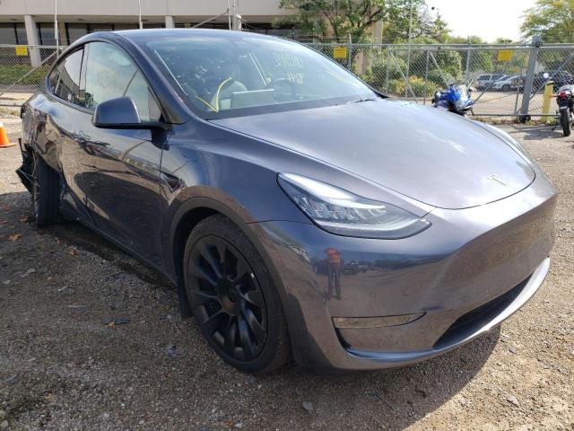 TESLA MODEL Y 2022 with VIN 7SAYGAEEXNF381487 - Photo from auction