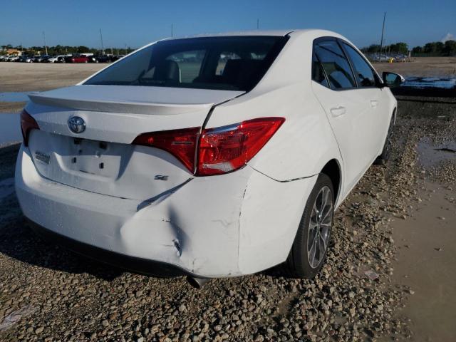 Photo 9 from auction – 2018 TOYOTA COROLLA SE with VIN 5YFBURHE3JP843697
