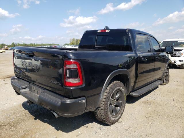 Photo 4 from auction – 2021 RAM 1500 REBEL with VIN 1C6SRFLTXMN573317