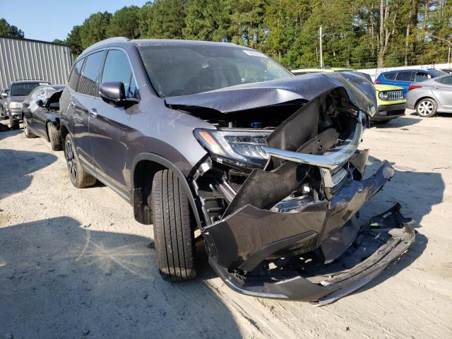 Photo 1 from auction – 2021 HONDA PILOT ELIT with VIN 5FNYF6H06MB071588