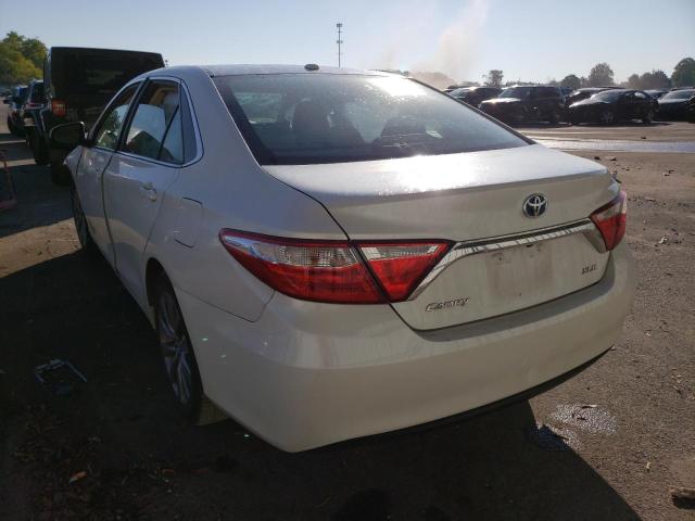 Photo 3 from auction – 2016 TOYOTA CAMRY HYBR with VIN 4T1BD1FK2GU183346