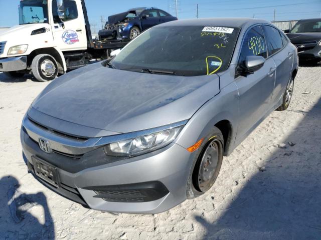 Photo 2 from auction – 2018 HONDA CIVIC LX with VIN 2HGFC2F57JH543831