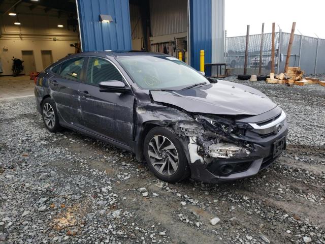 Photo 9 from auction – 2018 HONDA CIVIC EX with VIN 2HGFC2F85JH022682