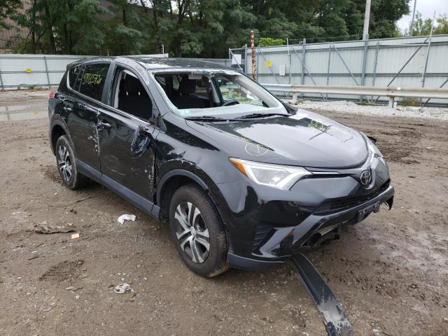 TOYOTA RAV4 LE 2018 with VIN 2T3BFREV7JW731232 - Photo from auction