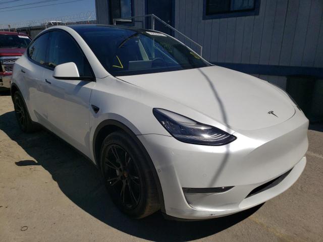 TESLA MODEL Y 2020 with VIN 5YJYGDEE1LF025263 - Photo from auction
