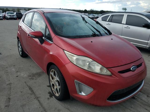 FORD FIESTA SES 2011 with VIN 3FADP4FJXBM142124 - Photo from auction