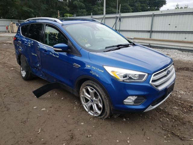 FORD ESCAPE TIT 2017 with VIN 1FMCU9J99HUD47314 - Photo from auction