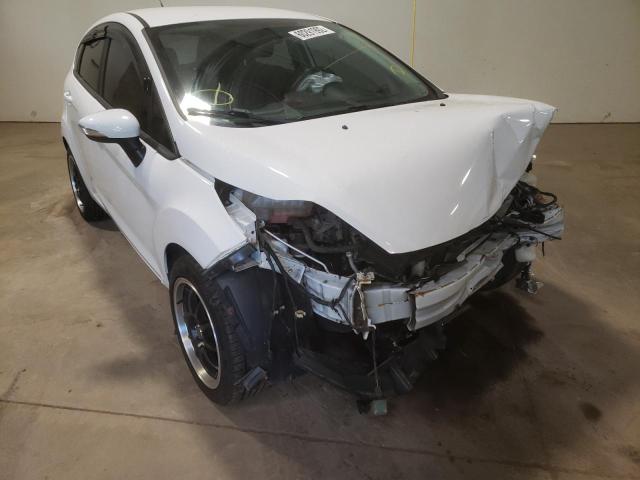 FORD FIESTA SES 2011 with VIN 3FADP4FJ3BM147939 - Photo from auction