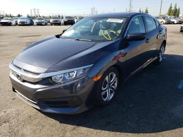 Photo 2 from auction – 2018 HONDA CIVIC LX with VIN 2HGFC2F54JH560439