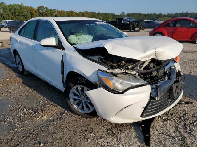 TOYOTA CAMRY LE 2016 with VIN 4T4BF1FK8GR519906 - Photo from auction