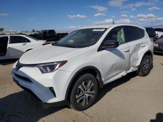 Photo 2 from auction – 2018 TOYOTA RAV4 LE with VIN JTMZFREV2JJ154428