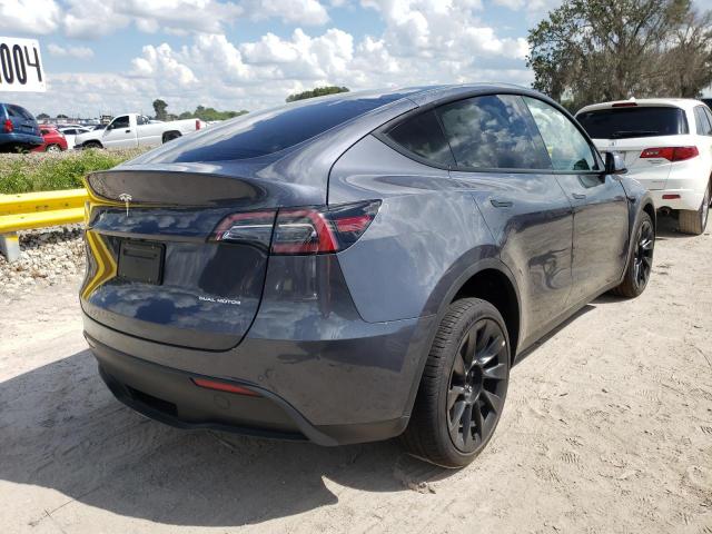 Photo 4 from auction – 2022 TESLA MODEL Y with VIN 7SAYGDEE9NF481565
