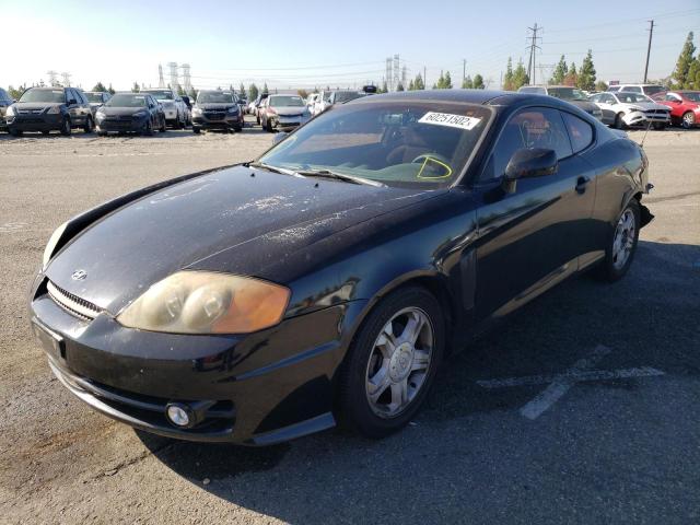 Photo 2 from auction – 2003 HYUNDAI TIBURON with VIN KMHHM65D33U098939