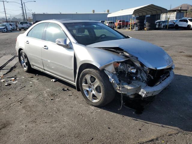 ACURA RL 2005 with VIN JH4KB16525C011100 - Photo from auction